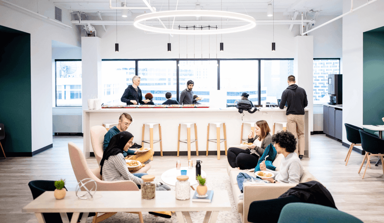 Employees enjoing lunch at work